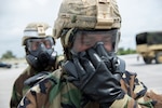 U.S. Army Soldiers from the 1-1 Air Defense Artillery Headquarters and Headquarters Battalion practice personnel decontamination procedures during a joint Exercise May 12, 2016, at Kadena Air Base, Japan. During the training, U.S. Air Force Airmen from the 18th Civil Engineer Squadron’s Readiness and Emergency Management Flight instructed the personnel decontamination, while Soldiers from the 1-1 ADA explained vehicle decontamination. The exercise gave participating Soldiers and Airmen alike a chance to work together to bolster interoperability for the continued support and defense of Okinawa and the Indo-Asia-Pacific region. 