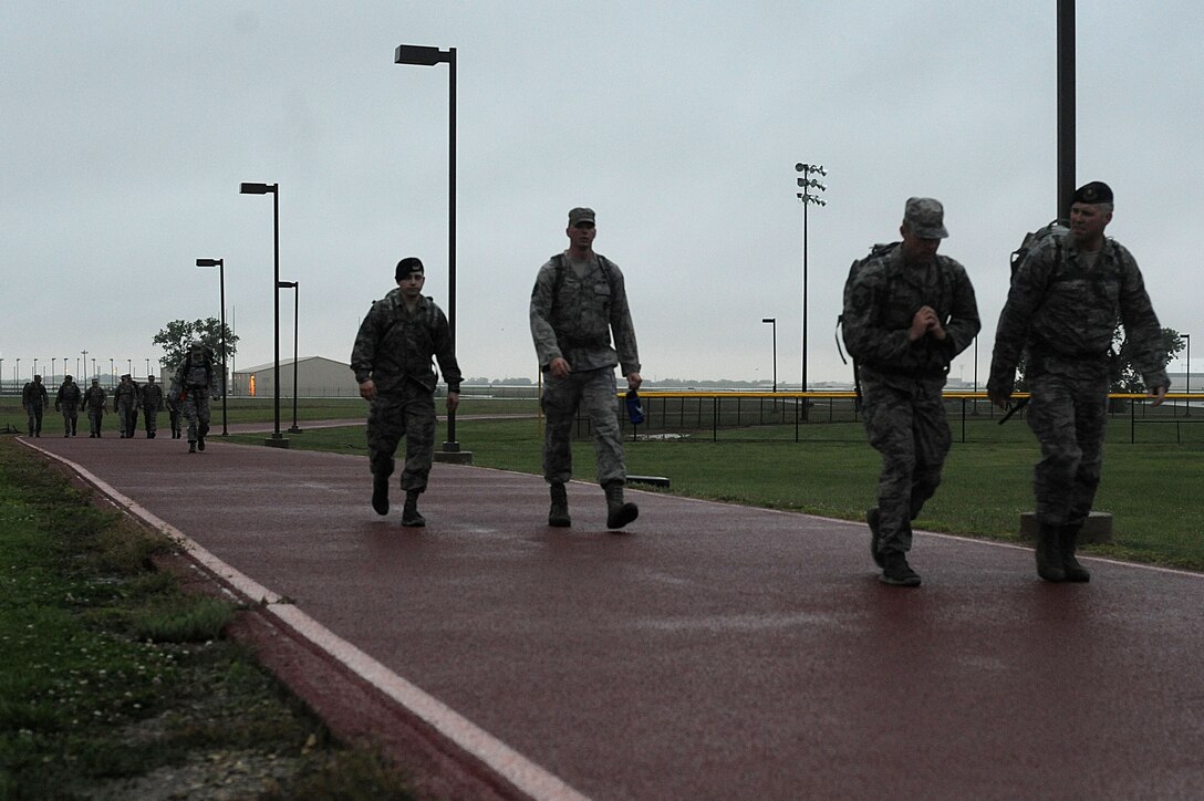 22nd Security Forces members participate in a ruck march, May 16, 2016, at McConnell Air Force Base, Kan. The march was in remembrance of fallen security forces members and kicked off the beginning of Police Week. (U.S. Air Force photo/Airman 1st Class Jenna K. Caldwell)