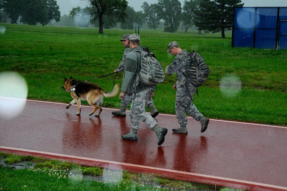 Team McConnell participate in the 22nd Security Forces ruck march, May 16, 2016, at McConnell Air Force Base, Kan. The march was in remembrance of fallen security forces members and kicked off the beginning of Police Week. (U.S. Air Force photos/Airman 1st Class Jenna K. Caldwell)