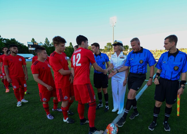 Commander, Naval Heath Clinic Charleston, Capt. Elizabeth Maley participated in the coin flip to begin the Charleston Battery Soccer game for their military appreciation night May 14, 2016, Charleston, S.C. The Charleston Battery cruised past Toronto FCII in a 2-0 victory. (U.S. Navy Photo by Mass Communication Specialist 1st Class Sean M. Stafford/Released)