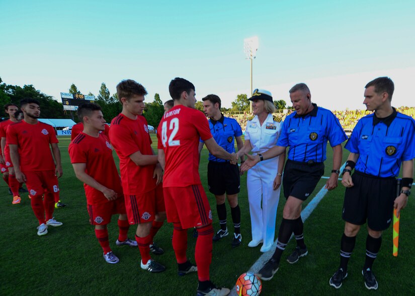 Commander, Naval Heath Clinic Charleston, Capt. Elizabeth Maley participated in the coin flip to begin the Charleston Battery Soccer game for their military appreciation night May 14, 2016, Charleston, S.C. The Charleston Battery cruised past Toronto FCII in a 2-0 victory. (U.S. Navy Photo by Mass Communication Specialist 1st Class Sean M. Stafford/Released)