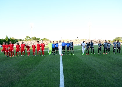 Commander, Naval Heath Clinic Charleston, Capt. Elizabeth Maley participated in the coin flip to begin the Charleston Battery Soccer game for their military appreciation night May 14, 2016, Charleston, S.C. The Charleston Battery cruised past Toronto FCII in a 2-0 victory. (U.S. Navy Photo by Mass Communication Specialist 1st Class Sean M. Stafford/Released)