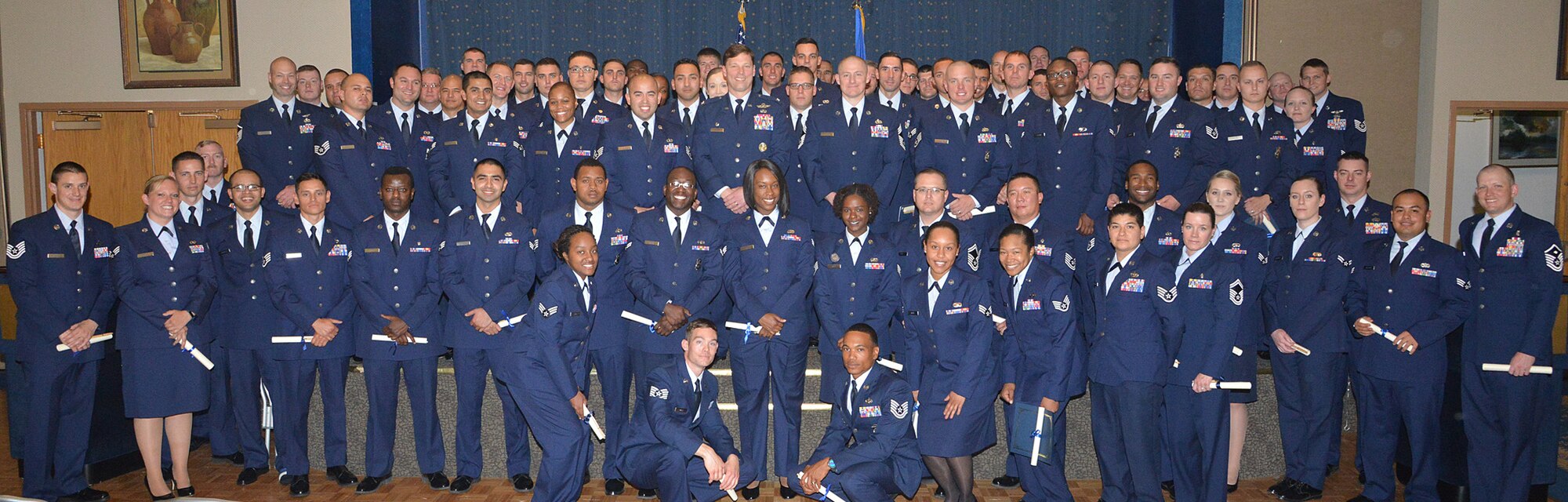 The annual Community College of the Air Force graduation ceremony honored 224 Kirtland graduates, who received 250 CCAF associate's degree in applied science degrees. Six Pitsenbarger Awards and one First Command Scholarship were awarded to selected hard working grads pursuing a higher level degree, and CCAF mentors were acknowledged for their outstanding performance and support of these grads. (Photo by Todd Berenger)