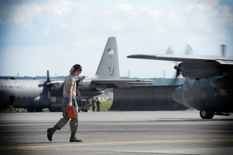 A 374th Aircraft Maintenance Squadron crew chief walks the flightline May 13, 2016,
after marshaling a C-130 Hercules at Yokota Air Base, Japan. The C-130H was
participating in a week-long exercise to practice Yokota's humanitarian aid and disaster
relief capabilities. (U.S. Air Force photo by Staff Sgt. Cody H. Ramirez/Released)