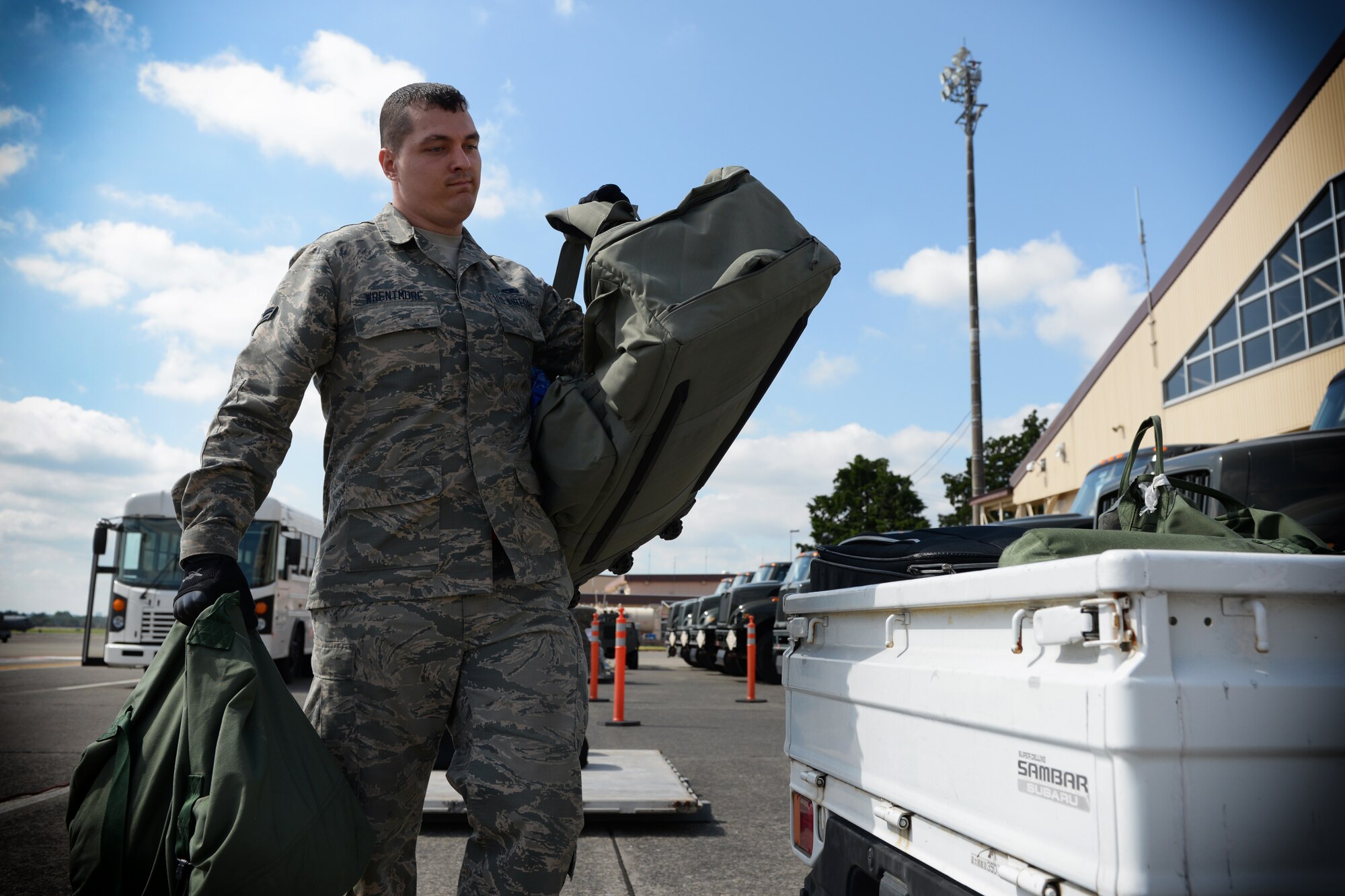 Airman 1st Class Kristopher Wrentmore, 374th Logistics Readiness Squadron combat
mobility flight, loads mock mobility bags into a truck at Yokota Air Base, Japan, May 13,
2016. Yokota practiced their humanitarian aid and disaster relief capabilities throughout
the week, including a simulated deployment line and departing flights. The bags
belonged to Airmen who represented possible support personnel who would be utilized
during an emergency response situation. (U.S. Air Force photo by Staff Sgt. Cody H.
Ramirez/Released)