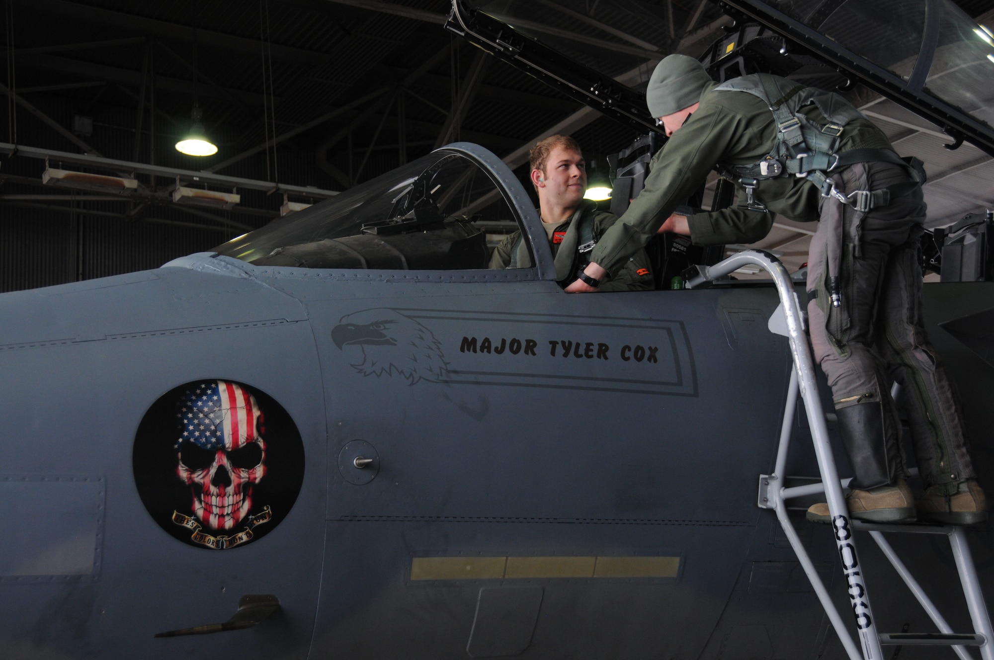 1st Lt. Colton Buechel of class 16-ABK listens to last minute advice from his instructor pilot as he prepares to start up the F-15 Eagle at Kingsley Field in Klamath Falls, Ore. (U.S. Air National Guard photo by Tech. Sgt. Jefferson Thompson)