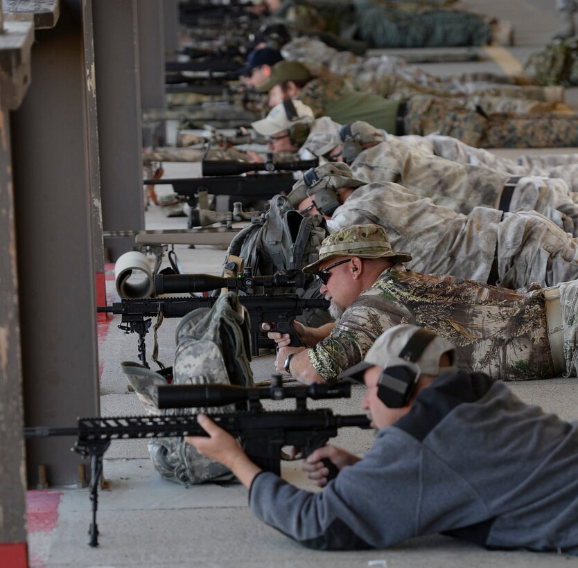 Local law enforcement officials fire at targets during a training exercise April 20, 2016, at Mountain Home Air Force Base, Idaho. 20 police officers from around the state of Idaho took part in the event. (U.S. Air Force photo by Airman 1st Class Chester Mientkiewicz/Released)