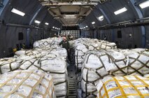 Twelve pallets of rice and beans sit aboard a C-5M Super Galaxy from Dover Air Force Base, Del., at Soto Cano Air Base, Honduras, May 13, 2016. Donations moved through the Denton Program at Soto Cano AB vary, but have previously consisted of medical equipment and supplies, food items, construction materials and machinery, clothes, children's articles, and vehicles. (U.S. Air Force photo by Staff Sgt. Siuta B. Ika)