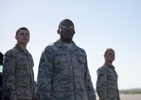 U.S. Air Force Airmen assigned to the 354th Medical Group (MDG) watch as a jet launches for a morning sortie during RED FLAG-Alaska 16-1, on May 12, 2015, Eielson Air Force Base, Alaska. Leadership within the 354 MDG sent small groups of Airmen to the flightline every morning during RF-A 16-1 to get a better understanding of the mission they support on a day-to-day basis. (U.S. Air Force photo by 1Lt Elias Zani/Released)