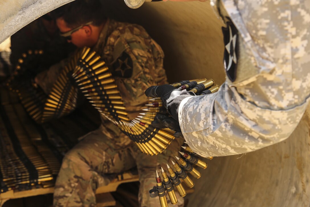 Explosive ordnance disposal technician Marines and Soldiers stage small fire arms to perform burning operations during Korea EOD Exercise, May 14, 2016, at Camp Rodriguez Live Fire Complex, South Korea. Burning operations are used to dispose large amounts of ammunition that can no longer be used. The Soldiers are with 718th EOD Company, 23rd Chemical Battalion, 48th Chemical Brigade. The Marines are with 3rd EOD Company, 9th Engineer Support Battalion, 3rd Marine Logistics Group, III Marine Expeditionary Force. (U.S. Marine Corps photo by Cpl. Isaac Ibarra/Released)