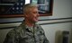 Chief Master Sgt. Robert Sealey, 501st Combat Support Wing command chief, smiles broadly, inside his office on RAF Alconbury, United Kingdom, April 28, 2016, while recalling the 