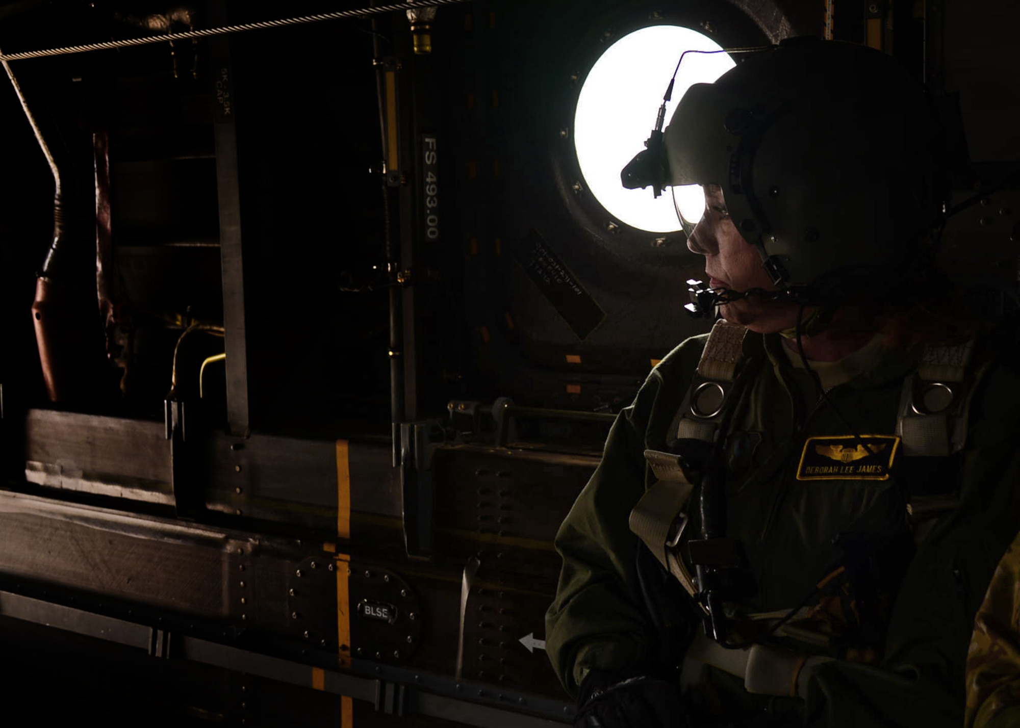 Air Force Secretary Deborah Lee James looks out the rear of a CV-22 Osprey during an aerial tour of Melrose Air Force Range May 17, 2016, over Melrose, N.M. James toured the wing to gain a deeper understanding of the Air Force Special Operations Command mission, and Cannon’s role in providing Special Operations Forces to the warfighter. (U.S. Air Force photo/Senior Airman Chip Slack)