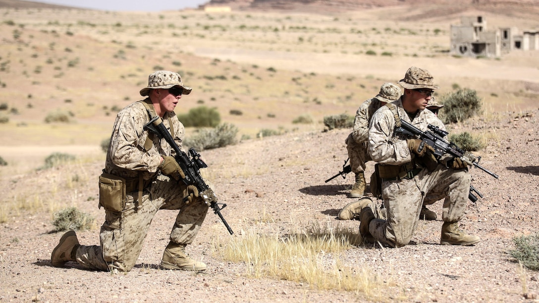 Marines with 1st Battalion, 2nd Marine Regiment, 2nd Marine Division provide patrol security during a squad-level exercise in Al Quweyrah, Jordan, May 14. During the exercise, platoon commanders relayed combat scenarios to squad leaders, leaving in their hands how to respond using the Marines and capabilities at their command. 