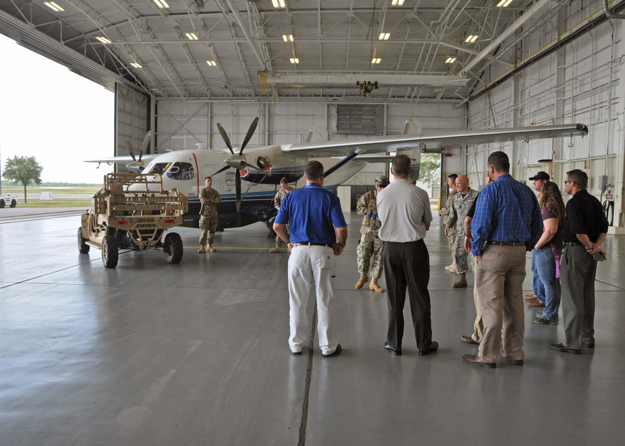 Employers listen to a briefer inside a hangar during the 919th Special Operations Wing’s Employer Appreciation Day at Duke Field, Fla., May 13, 2016.  Each year, the wing’s Citizen Air Commandos nominate their civilian employers to tour the base and learn more about their roles in national defense. (U.S. Air Force photo/Dan Neely)
