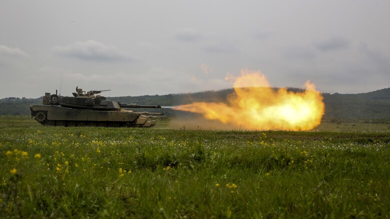 U.S. Marines with Combined Arms Company, Black Sea Rotational Force, fire downrange in an M1A1 Abrams tank for the tank live-fire exercise during Platinum Lion 16-3 at the Novo Selo Training Area, Bulgaria, May 12, 2016. The purpose behind Platinum Lion 16-3 is to build partner capacity through objective-focused training and increase Marines’ ability to work seamlessly with NATO Allies and partner nations around the world. 