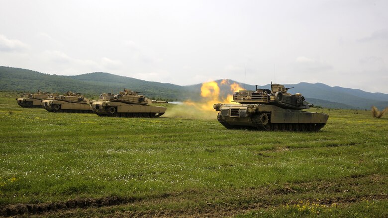U.S. Marines with Combined Arms Company, Black Sea Rotational Force, engage targets downrange in M1A1 Abrams tanks for the tank live-fire exercise during Platinum Lion 16-3 at the Novo Selo Training Area, Bulgaria, May 12, 2016. The purpose behind Platinum Lion 16-3 is to build partner capacity through objective-focused training and increase Marines’ ability to work seamlessly with NATO Allies and partner nations around the world. 