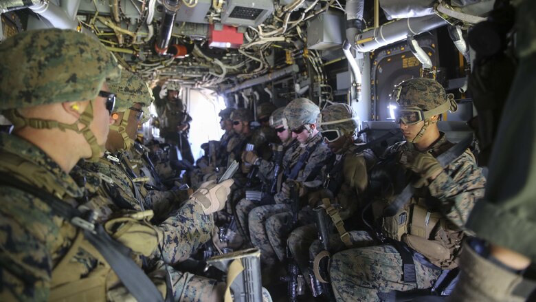 U.S. Marines with Bravo Company, Special Purpose Marine Air-Ground Task Force Crisis Response-Africa, check their gear and fasten their seat belts before departing in an MV-22 Osprey to conduct their final assault during Platinum Lion 16-3 at the Novo Selo Training Area, Bulgaria, May 14, 2016. Hundreds of troops from five NATO countries came together to train with mechanized assets and demonstrate the ability to work seamlessly as one force. 