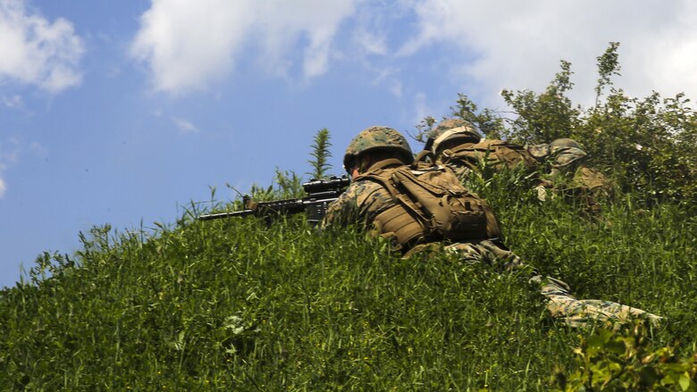 U.S. Marines with Bravo Company, Special Purpose Marine Air-Ground Task Force Crisis Response-Africa, fire downrange as part of their final assault during Platinum Lion 16-3 at the Novo Selo Training Area, Bulgaria, May 14, 2016. Hundreds of troops from five NATO countries came together to train with mechanized assets and demonstrate the ability to work seamlessly as one force. 