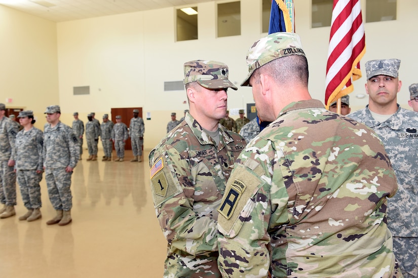 Col. Todd Zollinger, 157th Infantry Brigade commander, hands the battalion colors to Lt. Col. Jason A. Grider, incoming commander for the 3rd battalion, 335 Infantry Regiment, during their battle assembly weekend at Fort Sheridan, Illinois, May 15, 2016.
(U.S. Army photo by Spc. David Lietz/Released)