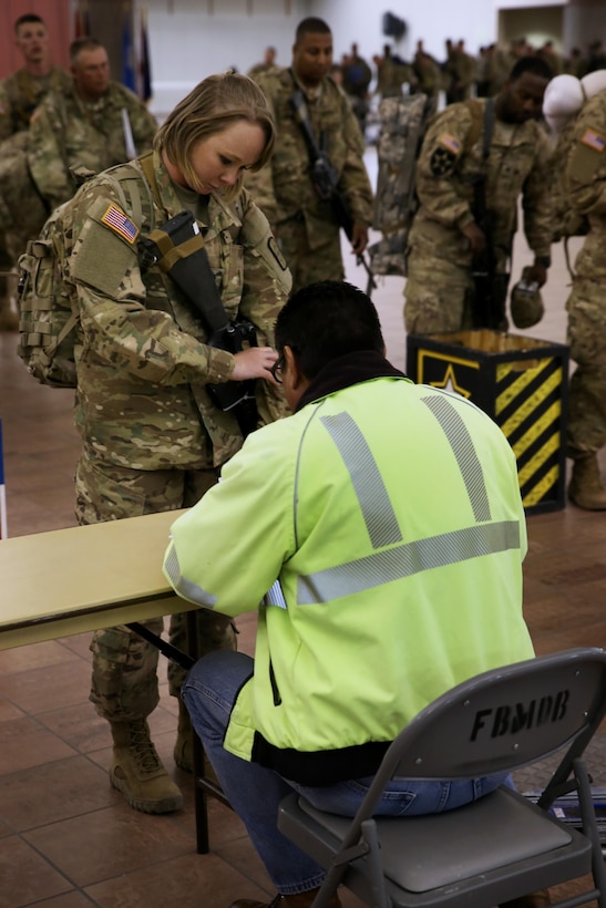 Soldiers assigned to the 863rd Engineer Battalion, 282nd Engineer Company, 945th Engineer Detachment, 313th Survey and Design Engineer Detachment, all Army Reserve units, and the 204th Engineer Detachment, Ohio Army National Guard, are processed and manifested prior to boarding at the Silas L. Copeland Arrival/Departure Airfield Control Group here May 2.