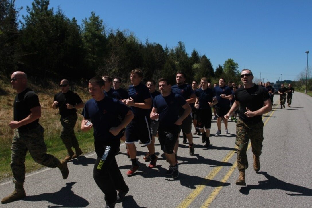 Marine Corps Poolees with Recruiting Sub-station Pikeville scream cadence during a formation run as part of Recruiting Station Charleston’s Statewide function April 16, 2016. The bi-annual event brought poolees from across West Virginia, Virginia, Tennessee and Kentucky together to participate in an Initial Strength Test and compete in a field meet. (U.S. Marine Corps photo by Sgt. Caitlin Brink/released)