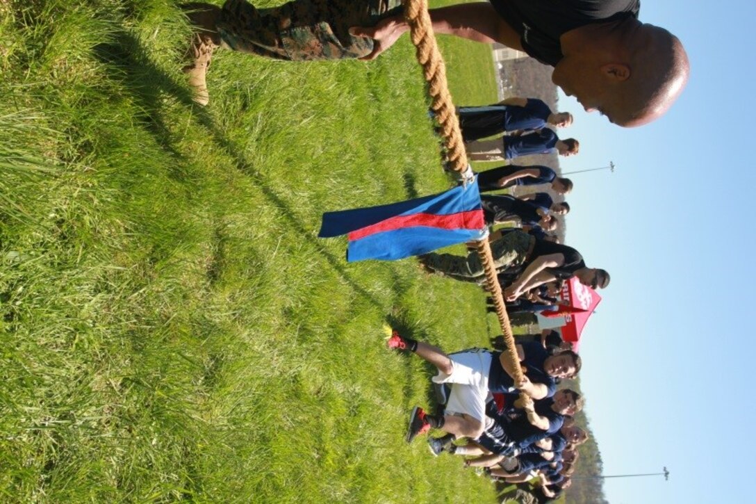 U.S. Marine Corps Poolees with Recruiting Sub-station Parkersburg battle to win a tug-of-war competition during Recruiting Station Charleston’s Statewide Function April 16, 2016. The bi-annual event brought poolees from across West Virginia, Virginia, Tennessee and Kentucky together to participate in an Initial Strength Test and compete in a field meet. (U.S. Marine Corps photo by Sgt. Caitlin Brink/released)