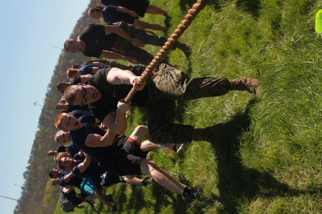 U.S. Marine Corps Sgt. Scott D. Childers, staff non-commissioned officer in charge of Recruiting Sub-station Beckley, motivates his poolees during Recruiting Station Charleston’s Statewide Function April 16, 2016. The bi-annual event brought poolees from across West Virginia, Virginia, Tennessee and Kentucky together to participate in an Initial Strength Test and compete in a field meet. Childers is a native of Zanesville, Ohio. (U.S. Marine Corps photo by Sgt. Caitlin Brink/released)