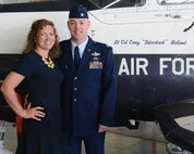 Lt. Col. Benjamin Holland, 85th Flying Training Squadron commander and his wife, Julie Holland, pose for a photo during a change of command ceremony at Laughlin Air Force Base, Texas, April 20, 2016. Holland is now the commander of the 85th FTS after moving up from the position of 434th FTS director of operations. (Courtesy Photo)