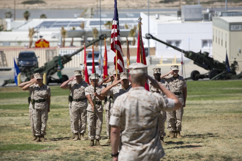 Maj. Gen. Lewis A Craparotta, Combat Center Commanding General, salutes Sgt. Maj. Karl Villalino, former Combat Center Sergeant Major, during a relief and appointment ceremony at Lance Cpl. Torrey L. Gray Field May 10, 2016. During the ceremony, Villalino relinquished his post as Combat Center Sergeant Major to Sgt. Maj. Michael J. Hendges and retired after 30 years of honorable service. (Official Marine Corps photo by Lance Cpl. Levi Schultz/Released)