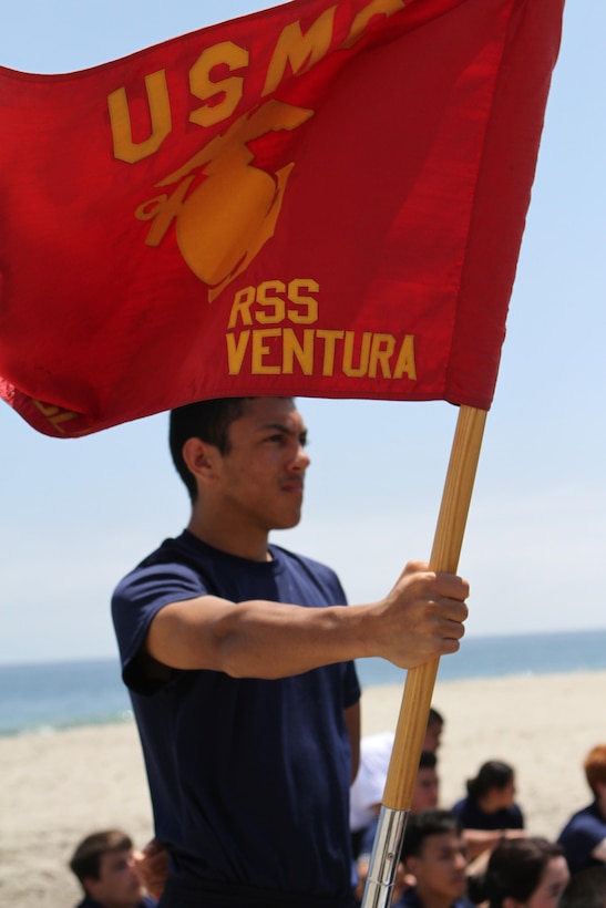 Jonathan Hernandez, the Recruiting Sub Station Ventura guide, observes as poolees from Recruiting Station Los Angeles compete in the RSLA games at Point Mugu Beach during their annual pool function, May 14, 2016. Los Angeles Marines and more than 600 of their poolees participated in the 2016 annual pool function. After nearly six hours of competing in pull-ups, crunches, fitness relays, tug-of-war, and many other activities, RSS Lancaster came out on top as the RSLA pool function champions. (U.S. Marine Corps photo by Staff Sgt. Alicia R. Leaders/Released)