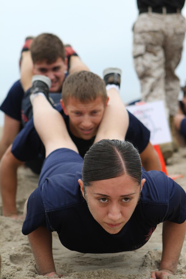 Recruiting Sub Station Culver City poolees participate in squad push-ups during Recruiting Station Los Angeles’ Annual Pool Function at Point Mugu Beach, May 14, 2016. Los Angeles Marines and more than 600 of their poolees participated in the 2016 annual pool function. After nearly six hours of competing in pull-ups, crunches, fitness relays, tug-of-war, and many other activities, RSS Lancaster came out on top as the RSLA pool function champions. (U.S. Marine Corps photo by Staff Sgt. Alicia R. Leaders/Released)