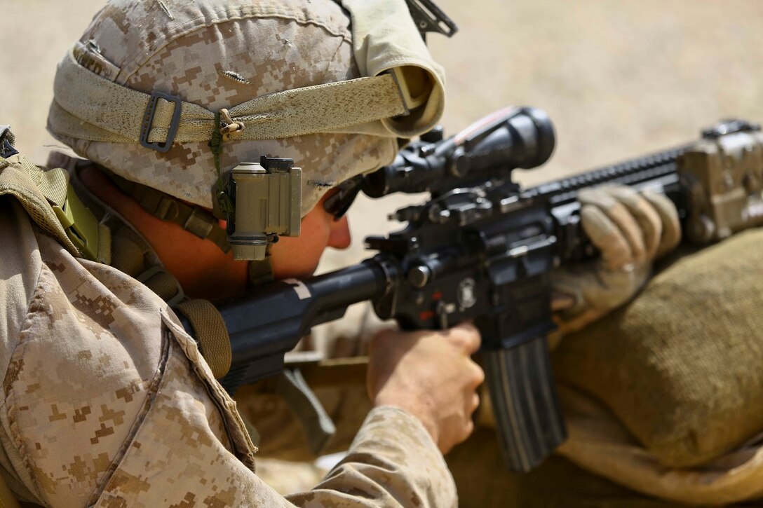 A U.S. Marine with 2nd Battalion, 7th Marine Regiment, Special Purpose Marine Air Ground Task Force Crisis Response Central Command 16.2, participates in a live fire range during Exercise Eager Lion 16 at King Abdullah II Special Operations Training Center, Kingdom of Jordan on May 17, 2016. Eager Lion 16 is a US military bi-lateral exercise with the Hashemite Kingdom of Jordan designed to strengthen relationships and interoperability between partner nations. (U.S. Marine Corps photo by Cpl. Lauren Falk 5th MEB COMCAM/Released)