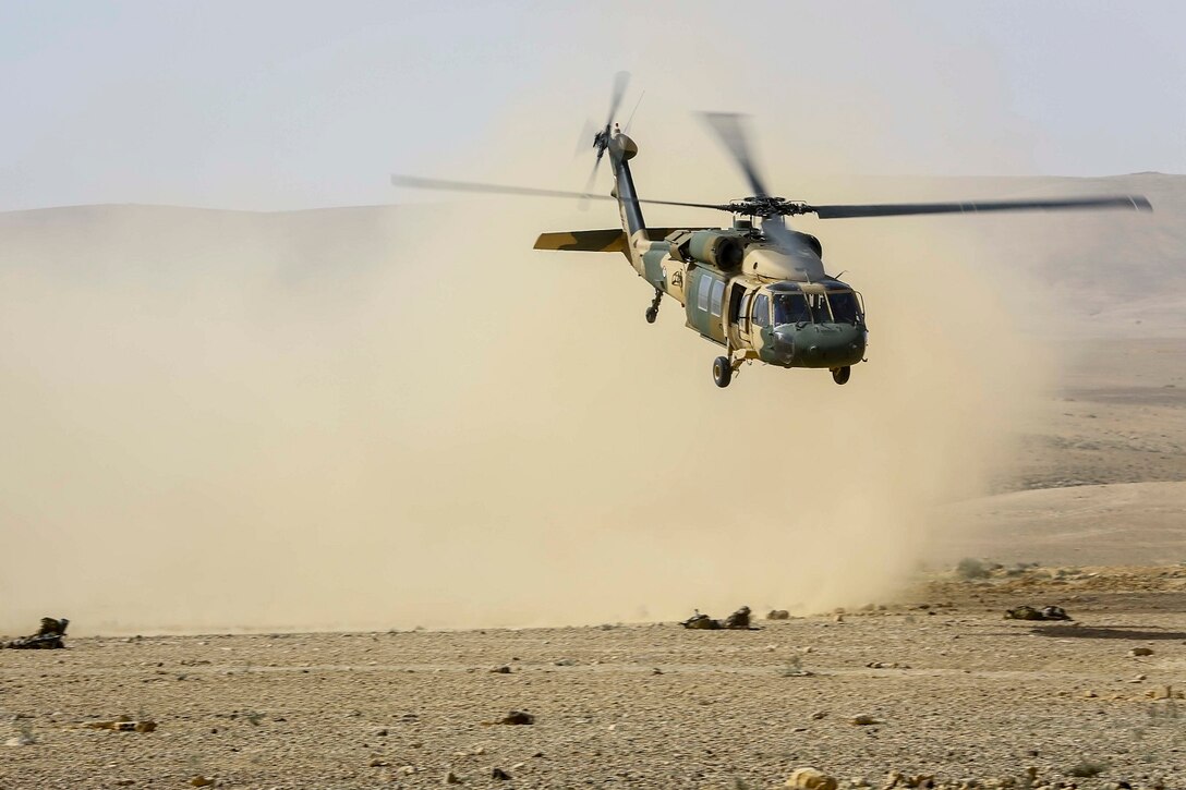 A Jordanian Armed Forces UH-60 Blackhawk with A- Squadron, practice infils and exfils prior to a live fire event during Exercise Eager Lion 16 at Armor Range, Quick Reaction Force, Kingdom of Jordan on May 16, 2016. Eager Lion 16 is a US military bi-lateral exercise with the Hashemite Kingdom of Jordan designed to strengthen relationships and interoperability between partner nations while conducting contingency operations. (U.S. Marine Corps photo by Cpl. Lauren Falk 5th MEB COMCAM/Released)