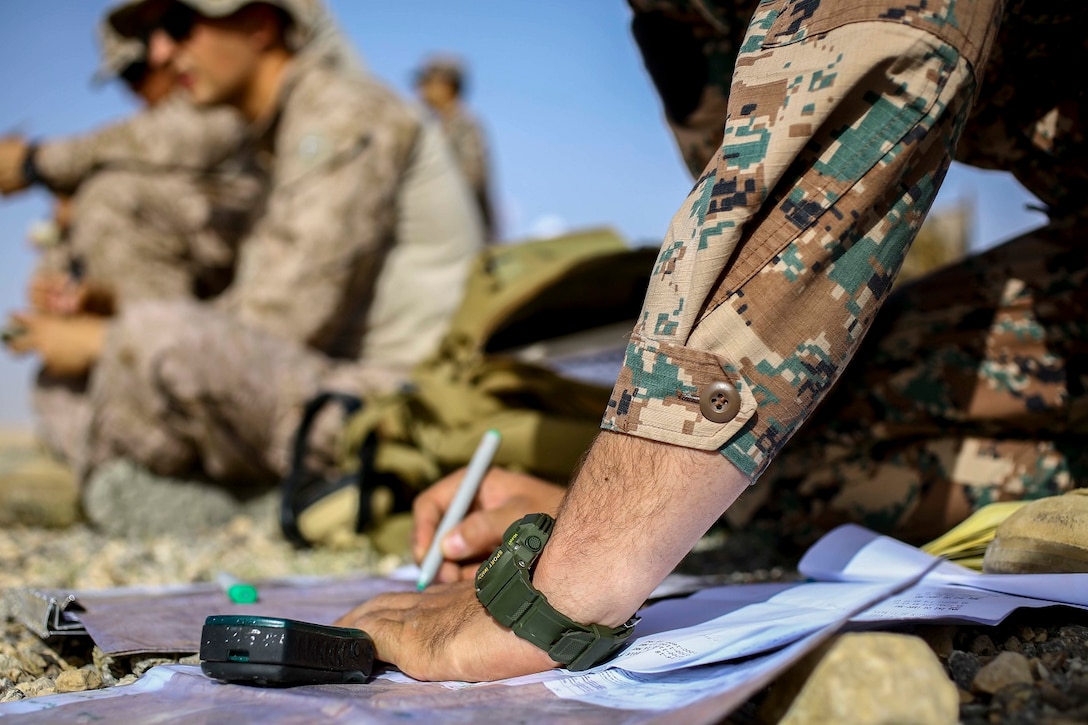 Members of the Jordanian Armed Forces work alongside U.S. Marines with 3rd Air Naval Gunfire Liaison Company, Special Purpose Marine Air Ground Task Force 16.2, to direct air support during Exercise Eager Lion 16 at Armor Range, Quick Reaction Force, Kingdom of Jordan on May 16, 2016. Eager Lion 16 is a US military bi-lateral exercise with the Hashemite Kingdom of Jordan designed to strengthen relationships and interoperability between partner nations while conducting contingency operations. (U.S. Marine Corps photo by Cpl. Lauren Falk 5th MEB COMCAM/Released)