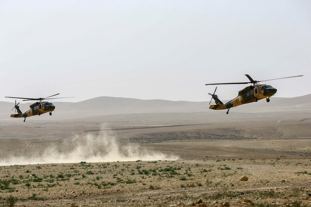 Jordanian Armed Forces UH-60 Blackhawks with A- Squadron, practice infils and exfils prior to a live fire event during Exercise Eager Lion 16 at Armor Range, Quick Reaction Force, Kingdom of Jordan on May 16, 2016. Eager Lion 16 is a US military bi-lateral exercise with the Hashemite Kingdom of Jordan designed to strengthen relationships and interoperability between partner nations while conducting contingency operations. (U.S. Marine Corps photo by Cpl. Lauren Falk 5th MEB COMCAM/Released)