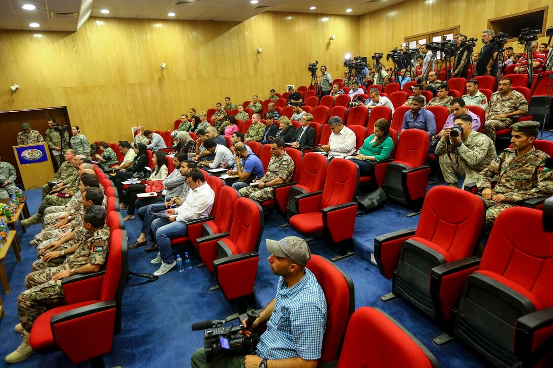 Members of the media, which included reporters from BBC Arabic, CNN, Al Jazeera, Al-Arabyia, Sky News, and local Jordanian news outlets, attend a press conference during Exercise Eager Lion 16 at Jordanian Special Operations Command military headquarters in Amman, Kingdom of Jordan, May 15. Eager Lion 16 is a bi-lateral exercise in the Hashemite Kingdom of Jordan between the Jordanian Armed Forces and the U.S. Military designed to strengthen relationships and interoperability between partner nations while conducting contingency operations. (U.S. Marine Corps photo by Cpl. Lauren Falk 5th MEB COMCAM/Released)
