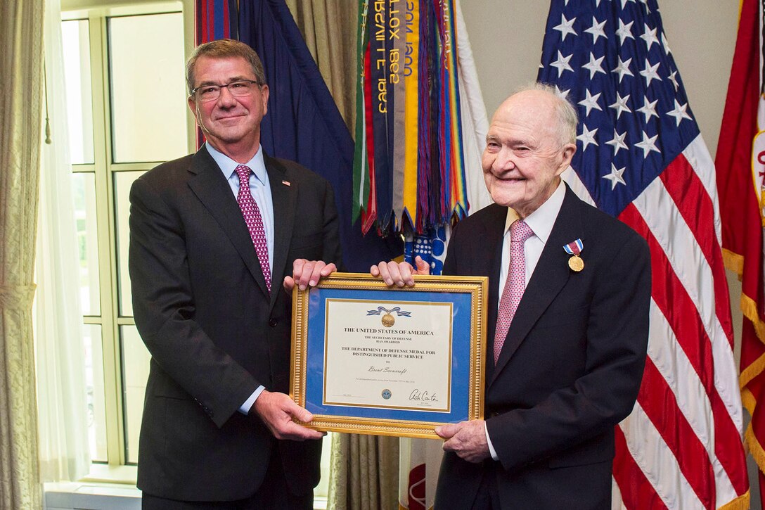 Defense Secretary Ash Carter presents retired Air Force Lt. Gen. Brent Scowcroft with the Department of Defense Medal for Distinguished Public Service during an awards ceremony at the Pentagon, May 18, 2016. DoD photo by Senior Master Sgt. Adrian Cadiz
