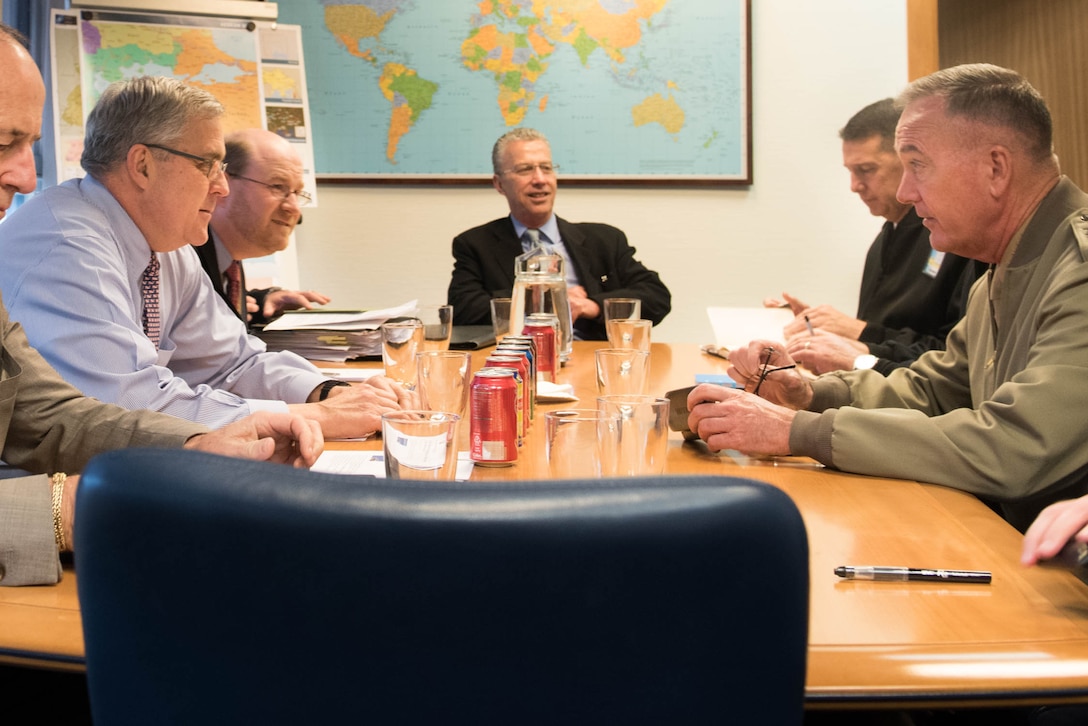 Marine Corps Gen. Joe Dunford, chairman of the Joint Chiefs of Staff,  meets with U.S. Ambassador to NATO Douglas E. Lute at NATO headquarters in Brussels, May 17, 2016. DoD photo by D. Myles Cullen
