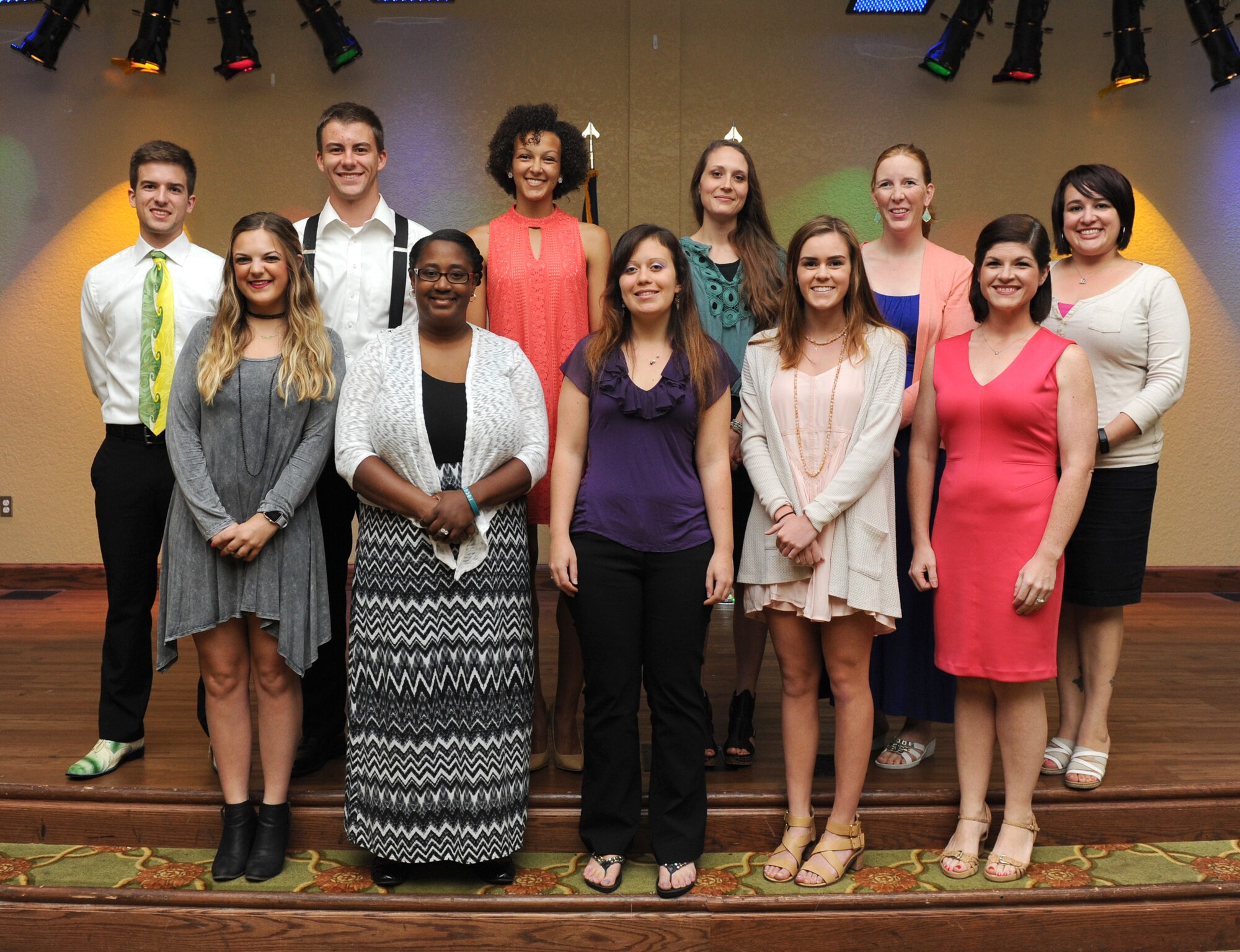 Keesler dependents pose for a photo during the 2016 Keesler Spouses Club Scholarship Award Banquet at the Bay Breeze Event Center, May 17, 2016, Keesler Air Force Base, Miss. The KSC gave out 13 scholarships that totaled approximately $30,000. (U.S. Air Force photo by Kemberly Groue)