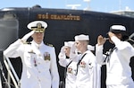 JOINT BASE PEARL HARBOR-HICKAM, Hawaii (May 17, 2016) Commander Andrew T. Miller salutes sideboys during the change-of-command ceremony for the Los Angeles-class fast-attack submarine USS Charlotte (SSN 766) in Joint Base Pearl Harbor-Hickam. Charlotte recently returned to Pearl Harbor following the successful completion of a six-month Western Pacific deployment. (U.S. Navy photo by Mass Communication Specialist 2nd Class Michael H. Lee)