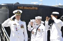 JOINT BASE PEARL HARBOR-HICKAM, Hawaii (May 17, 2016) Commander Andrew T. Miller salutes sideboys during the change-of-command ceremony for the Los Angeles-class fast-attack submarine USS Charlotte (SSN 766) in Joint Base Pearl Harbor-Hickam. Charlotte recently returned to Pearl Harbor following the successful completion of a six-month Western Pacific deployment. (U.S. Navy photo by Mass Communication Specialist 2nd Class Michael H. Lee)