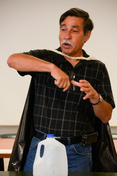 Alfred Garza, 2nd Civil Engineer Squadron environmental flight recycling manager, teaches children about the importance of recycling during an Earth Day field trip at Barksdale Air Force Base, La., April 29, 2016. Garza explained that 92 percent of all materials that are normally thrown in the trash can be recycled. (U.S. Air Force photo/Senior Airman Amanda Morris)