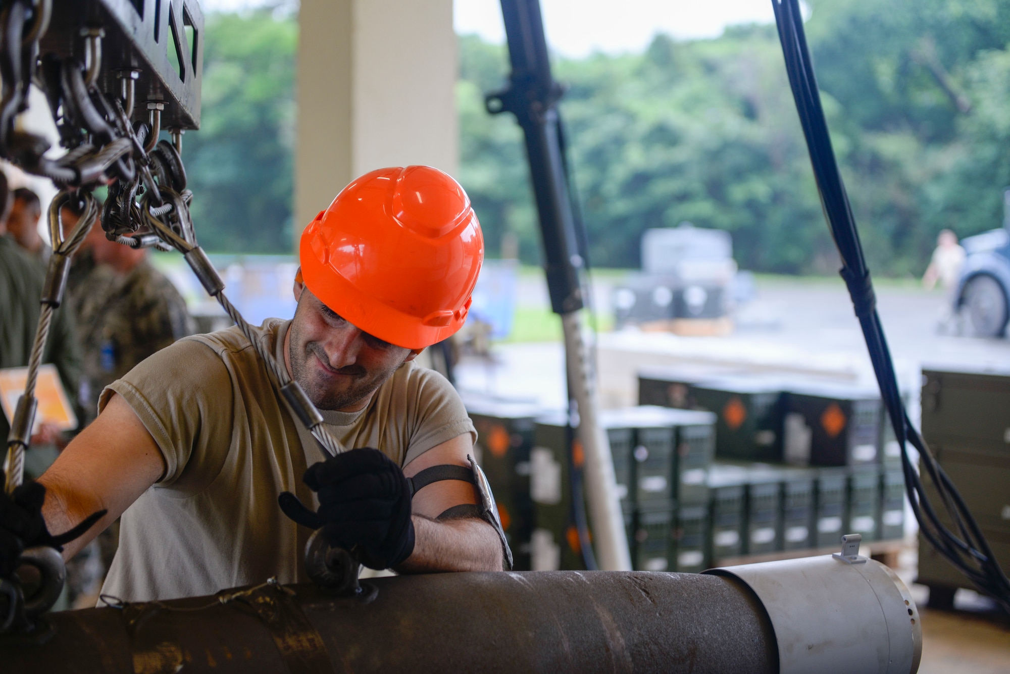 U.S. Air Force Staff Sgt. Kennan Riley, 35th Maintenance Squadron munitions crew chief, loads a “Little Bomb” on a trailer to be taken for inspection during a week-long Pacific Air Forces Combat Ammunition Production Exercise May 16, 2016, at Kadena Air Base, Japan. The Airmen were tested on their ability to build bombs in a simulated wartime scenario. (U.S. Air Force photo by Senior Airman Stephen G. Eigel/Released)