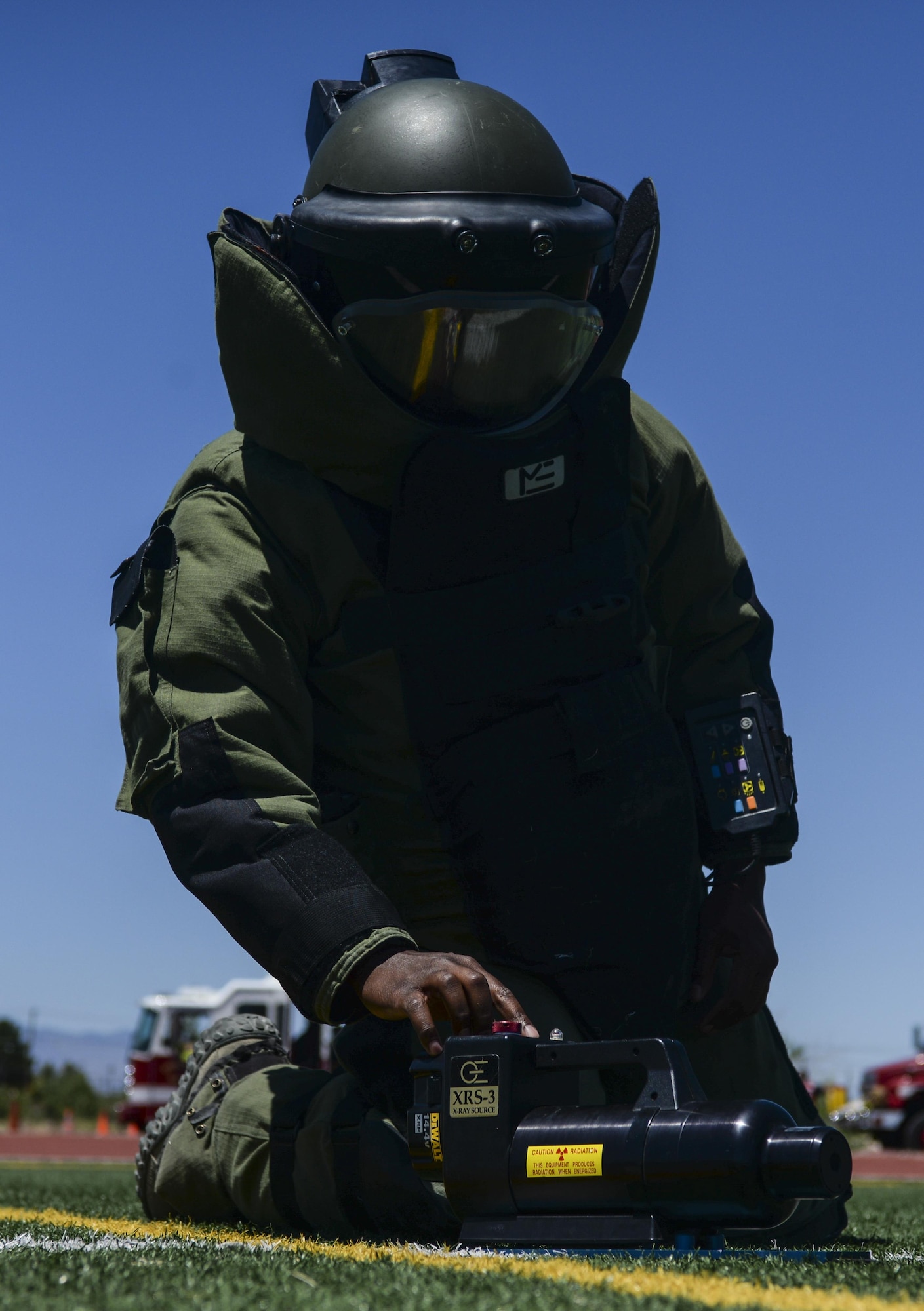 Staff Sgt. John Mitchell, 99th Civil Engineer Squadron explosive ordinance disposal technician, uses a portable X-ray device to map out a simulated explosive device during a base exercise at Nellis Air Force Base, Nev., May 12, 2016. The exercise will be used as a learning tool and will provide feedback on what went right and what areas that could be improved on. (U.S. Air Force photo by Airman 1st Class Kevin Tanenbaum)