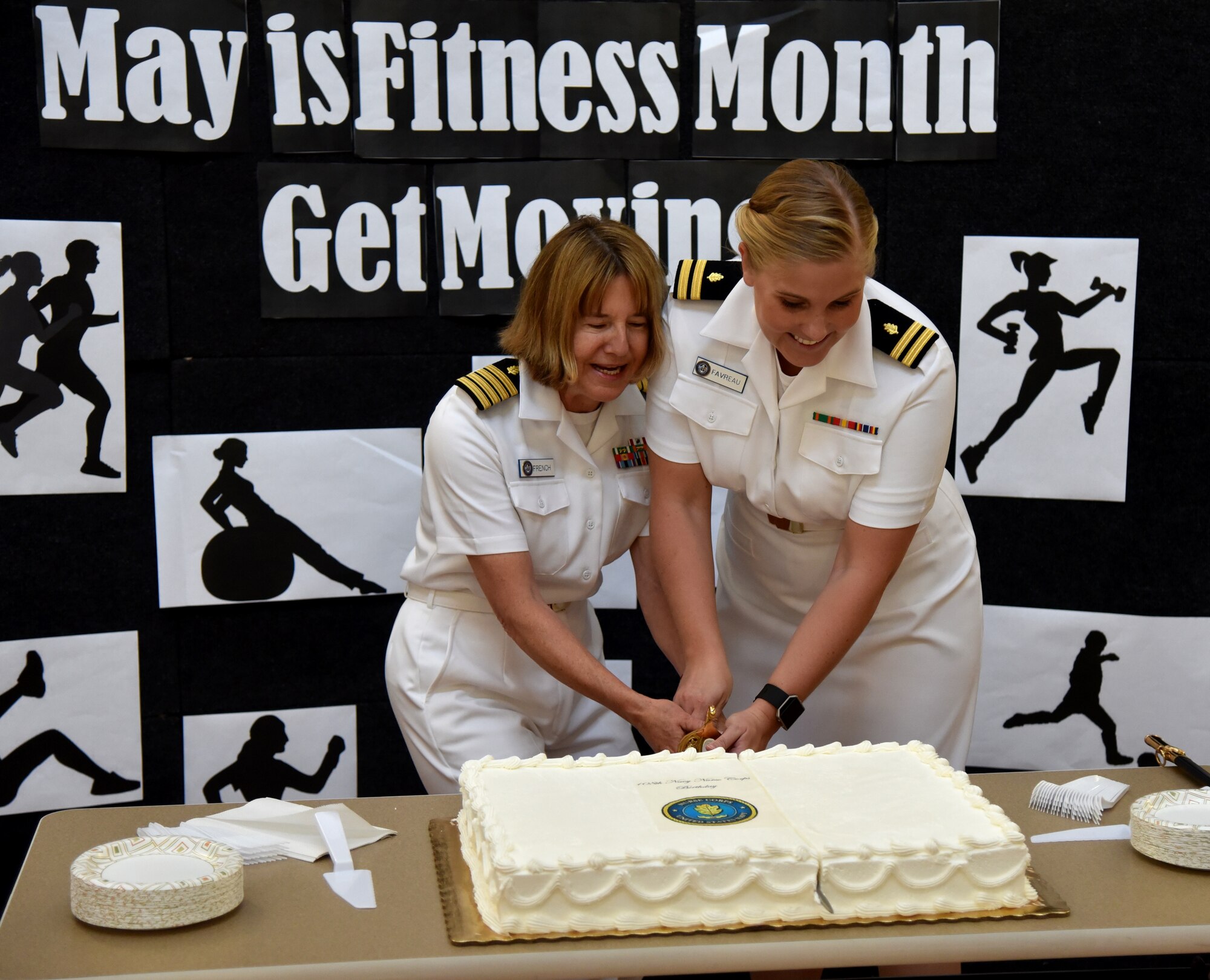 Capt. Elizabeth French, Senior Nurse Executive at Naval Health Clinic
Charleston (left), and Lt. Samantha Favreau, a nurse and the NHCC Military Home
Port Blue Team Leader, cut the cake during a ceremony May 13 at NHCC to
celebrate the 108th birthday of the Navy Nurse Corps. (Navy photo/ Petty
Officer 3rd Class Robert Jackson)
