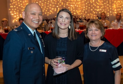 Col. Jimmy Canlas, vice commander, 437th Airlift Wing, Joint Base Charleston (left) and Glenn Jeffries, corporate communications officer, U.S. Army Corps of Engineers (right), thank Katie Stagliano, founder, Katie's Krops, for being the guest speaker at the Federal Executive Association's Annual Federal Employee of the Year Luncheon. The luncheon, held at the Red Bank Club, JB Charleston – Weapons Station, recognizes federal employees who go above and beyond their normal duties. Stagliano spoke about her non-profit company which advocates growing gardens and donating the produce to food banks to use for their meals. (U.S. Army Corps of Engineers photo/Sara Corbett)