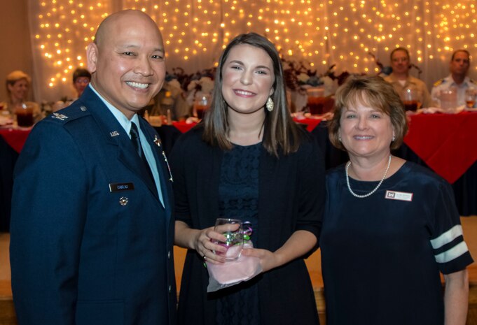 Col. Jimmy Canlas, vice commander, 437th Airlift Wing, Joint Base Charleston (left) and Glenn Jeffries, corporate communications officer, U.S. Army Corps of Engineers (right), thank Katie Stagliano, founder, Katie's Krops, for being the guest speaker at the Federal Executive Association's Annual Federal Employee of the Year Luncheon. The luncheon, held at the Red Bank Club, JB Charleston – Weapons Station, recognizes federal employees who go above and beyond their normal duties. Stagliano spoke about her non-profit company which advocates growing gardens and donating the produce to food banks to use for their meals. (U.S. Army Corps of Engineers photo/Sara Corbett)
