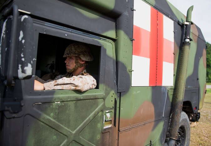 A Marine assigned to Surgical Company B, 4th Medical Battalion, drives an ambulance during a five-day medical field exercise May 13, 2016 at Joint Base Charleston, S.C. The exercise tested the capabilities of Surgical Company B’s forward resuscitative surgical system, or FRSS, which is a rapidly mobile trauma surgical team designed to be in close proximity to combat units on the battlefield. (U.S. Air Force photo/Staff Sgt. Jared Trimarchi) 