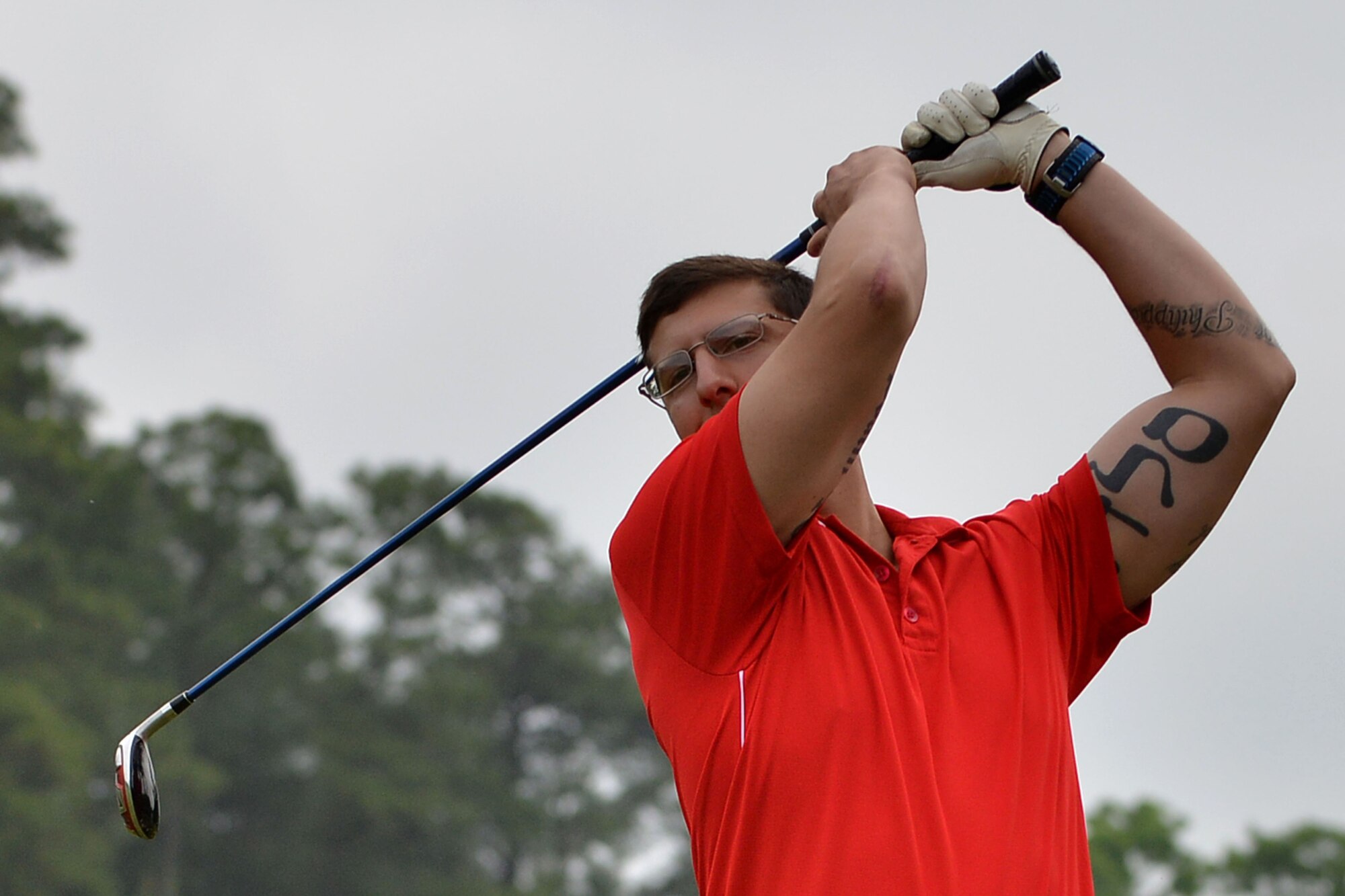 U.S. Air Force 1st Lt. Trevor Spiro, a financial analysis flight commander for the 633rd Comptroller Squadron, hits his ball onto the fairway during the Commander’s Cup Golf Tournament at Fort Eustis, Va., May 13, 2016. During the event, teams not only competed for top scores, but longest drive and “closest to the hole.” (U.S. Air Force photo by Staff Sgt. Natasha Stannard)