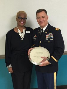 U.S. Army Col. William S. Galbraith, commander of the 733rd Mission Support Group, receives the Dana B. Hamel Award from Thomas Nelson Community College during their 47th annual commencement ceremony at the Hampton Coliseum in Hampton, Va., May 12, 2016. The award honors citizens who champion higher education and public service. Named in honor of Dr. Dana B. Hamel, the first chancellor of Virginia's Community Colleges, the award recognizes individuals for their commitment to public service; to fostering access to higher education and promoting an understanding of the role of workforce development as an essential part of Thomas Nelson's mission. (courtesy photo)